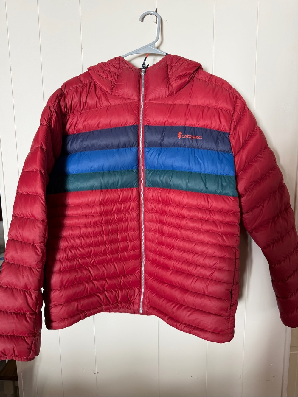 Cotopaxi Women’s Red Hooded Puffer Jacket with Color-Block Stripes